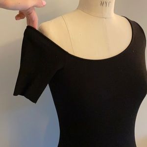 Helmet black asymmetrical dress.